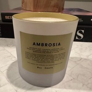 Boy smells candle - Ambrosia